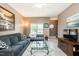 Spacious living room features wood-look floors, a glass coffee table and two sofas at 2203 Eider Ct # A, Graham, NC 27253