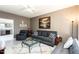 Cozy living room featuring neutral paint, plush seating, and lots of natural light at 2203 Eider Ct # A, Graham, NC 27253