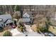Aerial view of the house and surrounding neighborhood at 224 Hartshorn Ct, Holly Springs, NC 27540