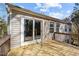Spacious wooden deck, perfect for outdoor entertaining, attached to a home with neutral siding at 224 Hartshorn Ct, Holly Springs, NC 27540