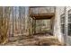 Backyard showing the deck and wooded area at 224 Hartshorn Ct, Holly Springs, NC 27540
