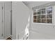 Bright bathroom featuring a large bathtub and a window at 224 Hartshorn Ct, Holly Springs, NC 27540