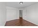 Bedroom boasts a large closet and sleek floors, with a neutral color palette at 224 Hartshorn Ct, Holly Springs, NC 27540