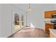 Bright dining area features sliding glass doors to a deck and neutral paint at 224 Hartshorn Ct, Holly Springs, NC 27540