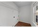 This room features washer and dryer hookups and wire shelving for easy organization at 224 Hartshorn Ct, Holly Springs, NC 27540