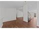 Bright living room featuring dark wood floors, and a neutral color palette with ample natural light at 224 Hartshorn Ct, Holly Springs, NC 27540