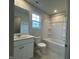 Bathroom featuring a vanity, combination tub and shower at 260 Johnson Ridge Way, Four Oaks, NC 27524