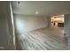 Bright living room boasts durable floors and seamless access to the modern kitchen at 260 Johnson Ridge Way, Four Oaks, NC 27524