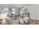 Bright living room with stylish furniture, a decorative mirror, and an inviting atmosphere at 260 Johnson Ridge Way, Four Oaks, NC 27524