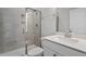 Beautiful bathroom with glass shower, modern vanity and fixtures at 267 N Maple Walk Dr # 217, Garner, NC 27529