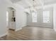 Dining area featuring modern lighting, stylish archways, and a built-in buffet at 267 N Maple Walk Dr # 217, Garner, NC 27529