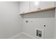 Bright laundry room with washer and dryer hookups for easy chores at 267 N Maple Walk Dr # 217, Garner, NC 27529