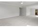 Large primary bedroom that includes carpet, a ceiling fan, and views to the en suite at 267 N Maple Walk Dr # 217, Garner, NC 27529