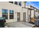 Backyard patio with tan vinyl siding and green space beyond at 2901 Benevolence Dr, Raleigh, NC 27610