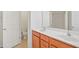 Bathroom vanity with double sinks, updated fixtures, and neutral walls at 2901 Benevolence Dr, Raleigh, NC 27610