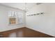 Bright dining room with chandelier lighting and ample natural light from the windows at 2901 Benevolence Dr, Raleigh, NC 27610