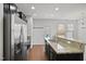 Stylish kitchen featuring stainless steel appliances and granite countertops with an open design at 2901 Benevolence Dr, Raleigh, NC 27610