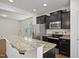 Well-equipped kitchen with stainless steel appliances and granite countertops providing ample counter space at 2901 Benevolence Dr, Raleigh, NC 27610