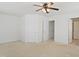 Spacious main bedroom with neutral carpet and ceiling fan with lights at 2901 Benevolence Dr, Raleigh, NC 27610