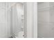 Shower with white shower curtain and built in shelving at 316 Russ Rd, Smithfield, NC 27577