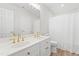 Elegant bathroom showcasing a double sink vanity with gold hardware and a shower at 316 Russ Rd, Smithfield, NC 27577