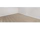 A bedroom with neutral carpet and a wall access panel at 316 Russ Rd, Smithfield, NC 27577