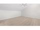 Bright, carpeted bedroom with a ceiling fan and vaulted ceiling at 316 Russ Rd, Smithfield, NC 27577