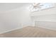 Bright bedroom with neutral carpet, ceiling fan, and natural light at 316 Russ Rd, Smithfield, NC 27577