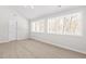 Bright bedroom featuring a ceiling fan and natural light from the window at 316 Russ Rd, Smithfield, NC 27577