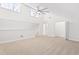 A spacious bedroom with ample natural light and neutral carpeting at 316 Russ Rd, Smithfield, NC 27577