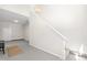 Bonus room with black bench, neutral decor and stairway at 316 Russ Rd, Smithfield, NC 27577