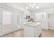 Modern kitchen with granite countertops, stainless appliances, and a view to the outdoors at 316 Russ Rd, Smithfield, NC 27577