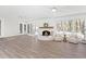 Spacious sunroom featuring a fireplace and a view to the outdoors at 316 Russ Rd, Smithfield, NC 27577