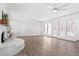 Bright living room showcasing an open layout with a white brick fireplace and natural light at 316 Russ Rd, Smithfield, NC 27577