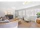 Living room with comfortable seating, a rustic coffee table, and a view of the outdoors at 316 Russ Rd, Smithfield, NC 27577