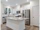 Modern kitchen with granite countertops, stainless steel appliances and white cabinetry at 326 Church St # 42, Wendell, NC 27591