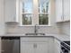 Bright kitchen featuring stainless steel appliances, granite countertops, and white cabinetry at 326 Church St # 42, Wendell, NC 27591
