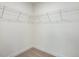 Walk-in closet with ample shelving and carpet flooring, perfect for organization at 326 Church St # 42, Wendell, NC 27591