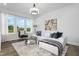 Inviting living room with a comfortable white sofa, modern decor, and an open layout with lots of light at 328 Church St # 43, Wendell, NC 27591