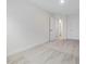 Neutral carpeted bedroom with two doors, access to hallway and ensuite bathroom at 330 Church St # 44, Wendell, NC 27591
