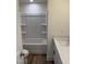 Bathroom with tile floors, a shower-tub combo, and a single sink vanity at 334 Church St # 46, Wendell, NC 27591