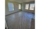 Bedroom with carpet and three windows providing natural light and neighborhood views at 334 Church St # 46, Wendell, NC 27591
