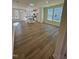 Spacious living room and kitchen area featuring hardwood floors and plenty of natural light at 334 Church St # 46, Wendell, NC 27591