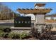 Elegant entrance sign for Larue community with stone accents and professional landscaping. Welcome home! at 336 Church St # 47, Wendell, NC 27591