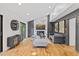Inviting living room with marble fireplace, hardwood floors and lots of natural light at 3506 Bellevue Rd, Raleigh, NC 27609