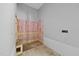 Partially finished bathroom with insulation, wood framing, and drywall installation at 3601 Alamance Dr, Raleigh, NC 27609