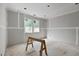 Unfinished bedroom with drywall installed and natural light from the windows at 3601 Alamance Dr, Raleigh, NC 27609