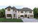 Beautiful new construction features painted brick, stone accents, two car garage, and manicured lawn at 3601 Alamance Dr, Raleigh, NC 27609