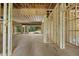 Interior view of a home under construction, showcasing wood framing and construction progress at 3601 Alamance Dr, Raleigh, NC 27609