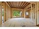 Home under construction showcasing interior framing, a framed window and an open floor plan at 3601 Alamance Dr, Raleigh, NC 27609